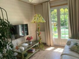 Apartamento luxo, vista para o jardim | Área de estar