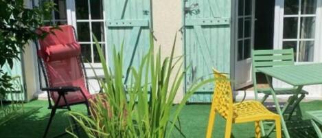 Appartement Deluxe, vue sur le jardin | Terrasse/patio