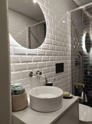 Hair dryer, towels, soap, shampoo