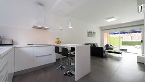 Apartment | Private kitchen | High chair - Duplex in Maspalomas Near Meloneras Beach (San Bartolomé de Tirajana)