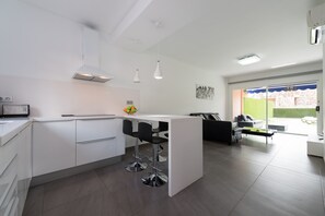 Appartement | Cuisine privée | Chaise haute
