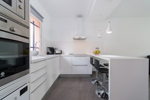 Apartment | Private kitchen | High chair - Duplex in Maspalomas Near Meloneras Beach (San Bartolomé de Tirajana)