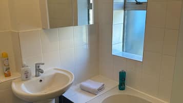 Hair dryer, towels, soap, toilet paper