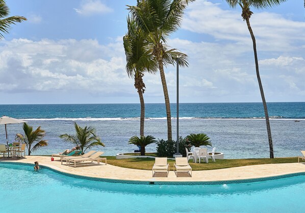 Outdoor pool, pool umbrellas, pool loungers