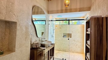 Shower, hair dryer, towels, soap
