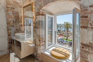 Deluxe Double Room, Sea View | 1 bedroom, minibar, in-room safe, desk