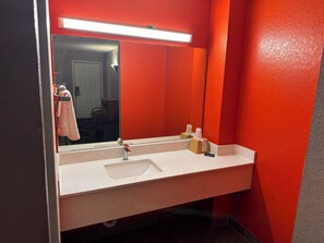 Combined shower/bathtub, soap, shampoo, toilet paper