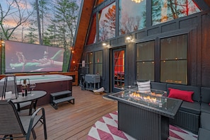 The photo highlights the front of the house, showcasing a charming outdoor area