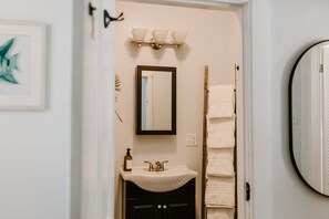 Hair dryer, towels, soap, shampoo