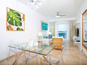Basic Condo, Balcony, Golf View | Living room | Flat-screen TV