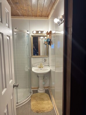 Shower, towels, soap, shampoo
