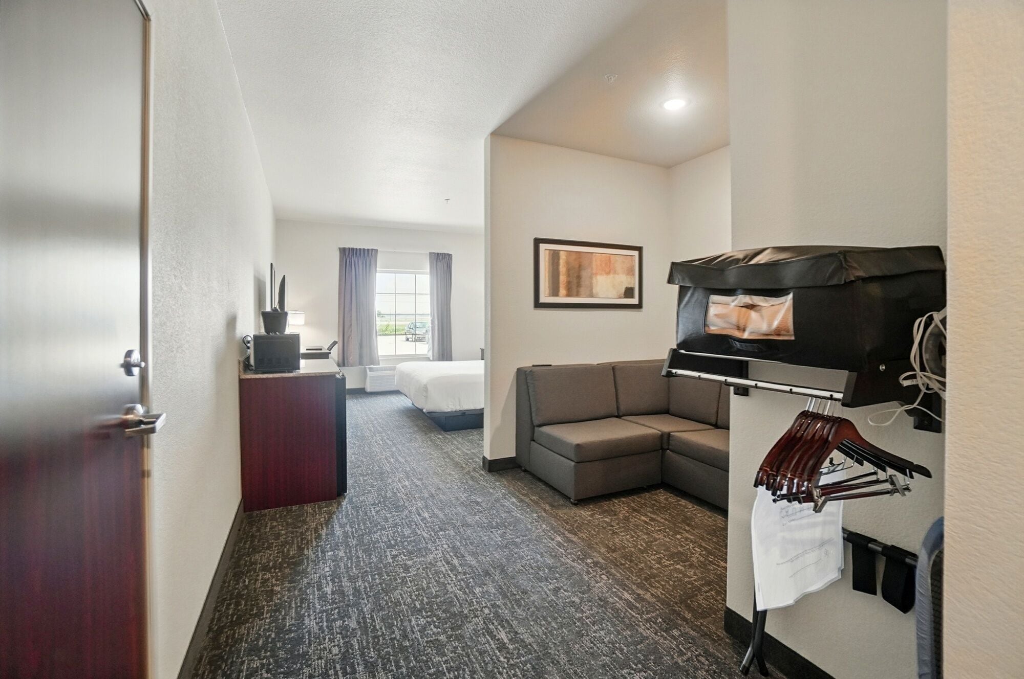 Studio, 1 Double Bed, Mobility Accessible, Non Smoking (Accessible Single King) | Desk, laptop workspace, iron/ironing board, free WiFi