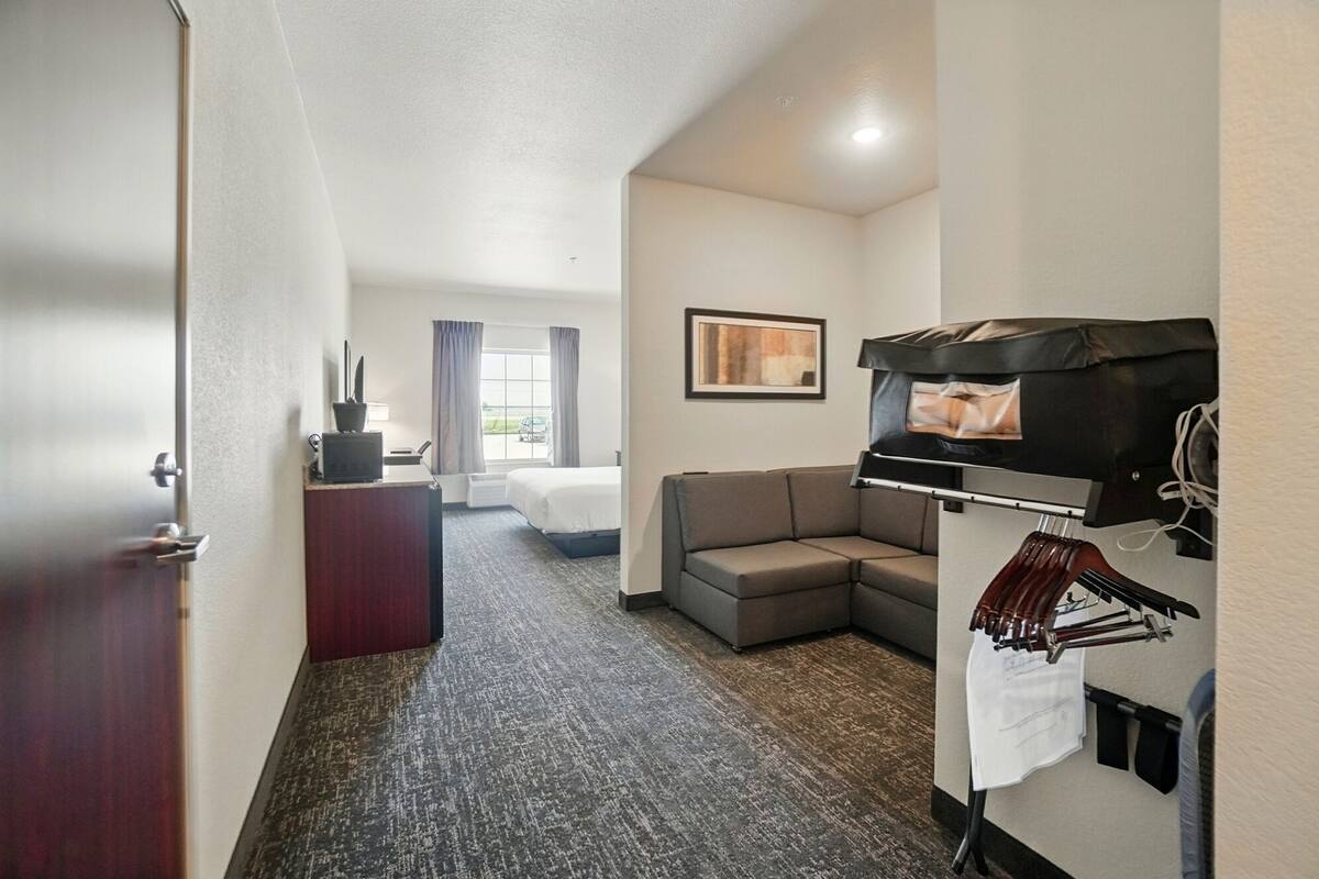 Studio, 1 Double Bed, Mobility Accessible, Non Smoking (Accessible Single King) | Desk, laptop workspace, iron/ironing board, free WiFi