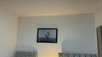 Family Triple Room, Non Smoking, City View | Iron/ironing board, free WiFi