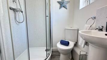 Hair dryer, towels, toilet paper