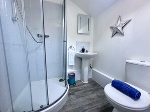 Hair dryer, towels, toilet paper