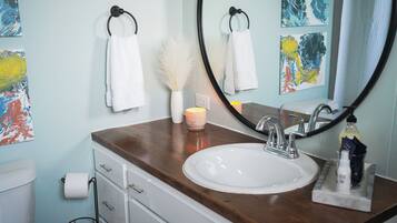 Hair dryer, towels, soap, toilet paper