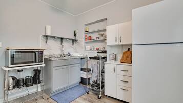 Fridge, microwave, coffee/tea maker, toaster