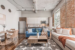 Apartamento, vista para o pátio | Área de estar