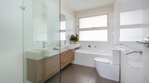 Shower, hair dryer, towels