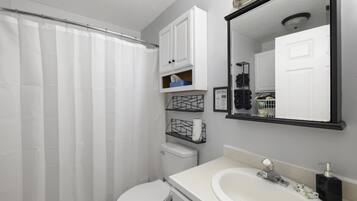 Hair dryer, towels, soap, shampoo