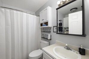 Hair dryer, towels, soap, shampoo