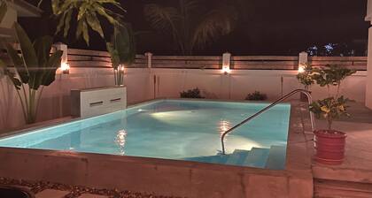 Downtown Dangriga! Style and comfort with a pool. Maya Mountains and sea views.