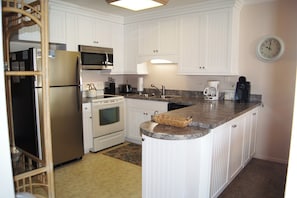 Condo, Multiple Beds, Pool Access, Ocean View (Sea Cloisters 302B) | Private kitchen | Coffee/tea maker