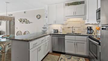 Condo, Multiple Beds, Pool Access, Ocean View (Sea Cloisters 201E) | Private kitchen | Coffee/tea maker