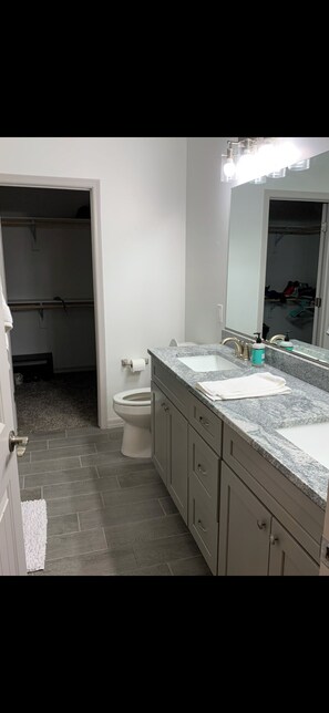 Shower, towels, soap, toilet paper