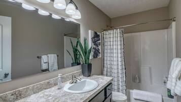 Hair dryer, towels, soap, toilet paper
