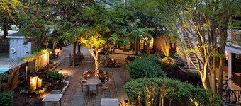 Garden-View Club Suite | Fireplace & Balcony