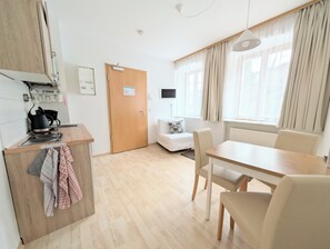 Appart'hôtel Classique, vue jardin | Cuisine privée