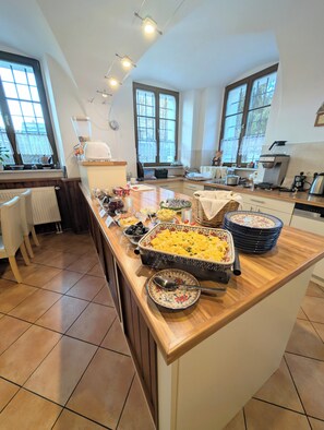 Daily buffet breakfast (EUR 14 per person)