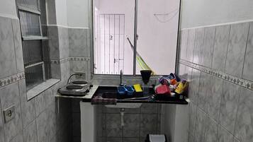 Shower, towels, soap, toilet paper