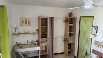 1 bedroom, desk, iron/ironing board, travel crib