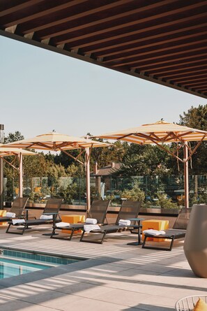 Outdoor pool, free cabanas, pool umbrellas