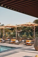 Outdoor pool, free cabanas, pool umbrellas