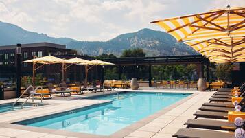 Outdoor pool, free cabanas, pool umbrellas