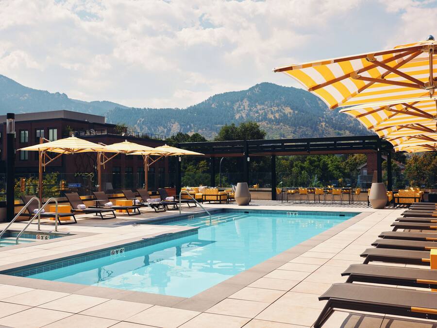 Outdoor pool, free pool cabanas, pool umbrellas