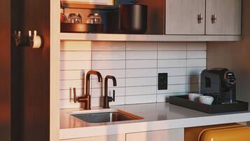 Suite (Boulder) | Living area | 65-inch Smart TV with cable channels, table football, ping pong