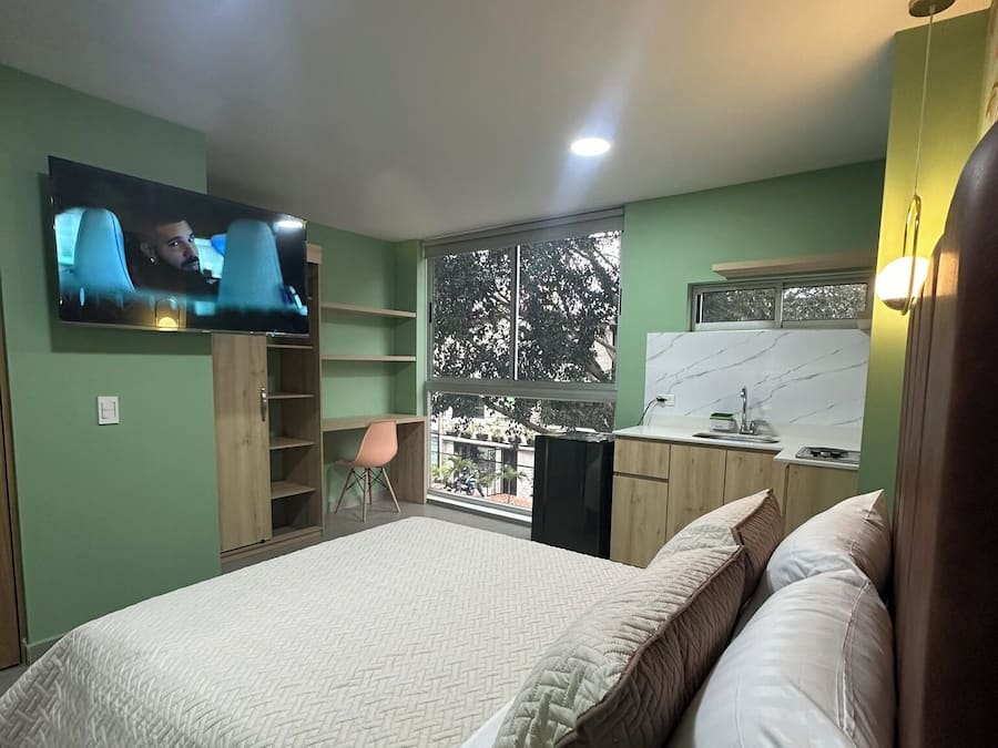 Studiosuite – executive | Dundyner, blendingsgardiner, wi-fi (inkludert) og sengetøy