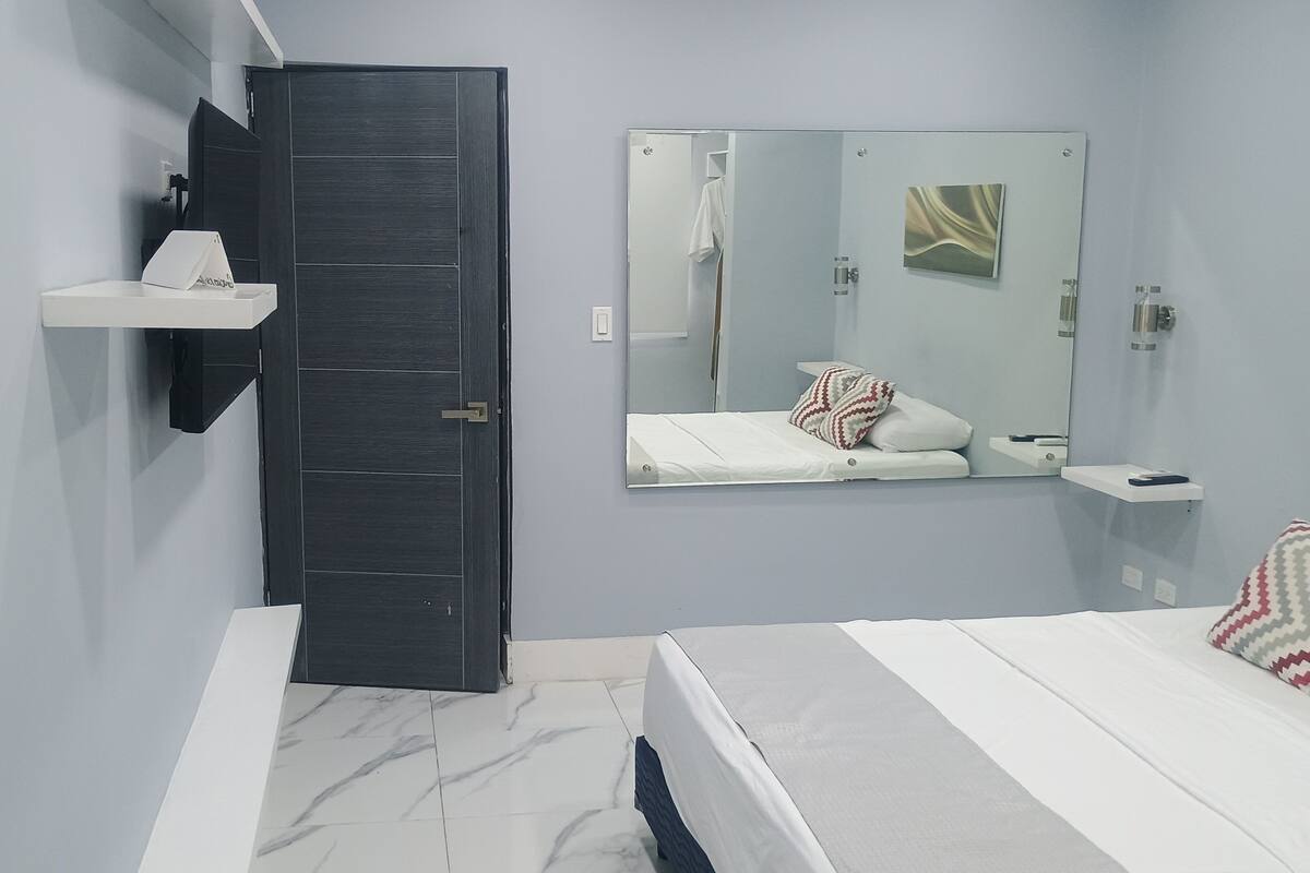Standard Double Room | Minibar, in-room safe, blackout curtains