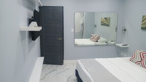 Standard Double Room | Minibar, in-room safe, blackout drapes, iron/ironing board