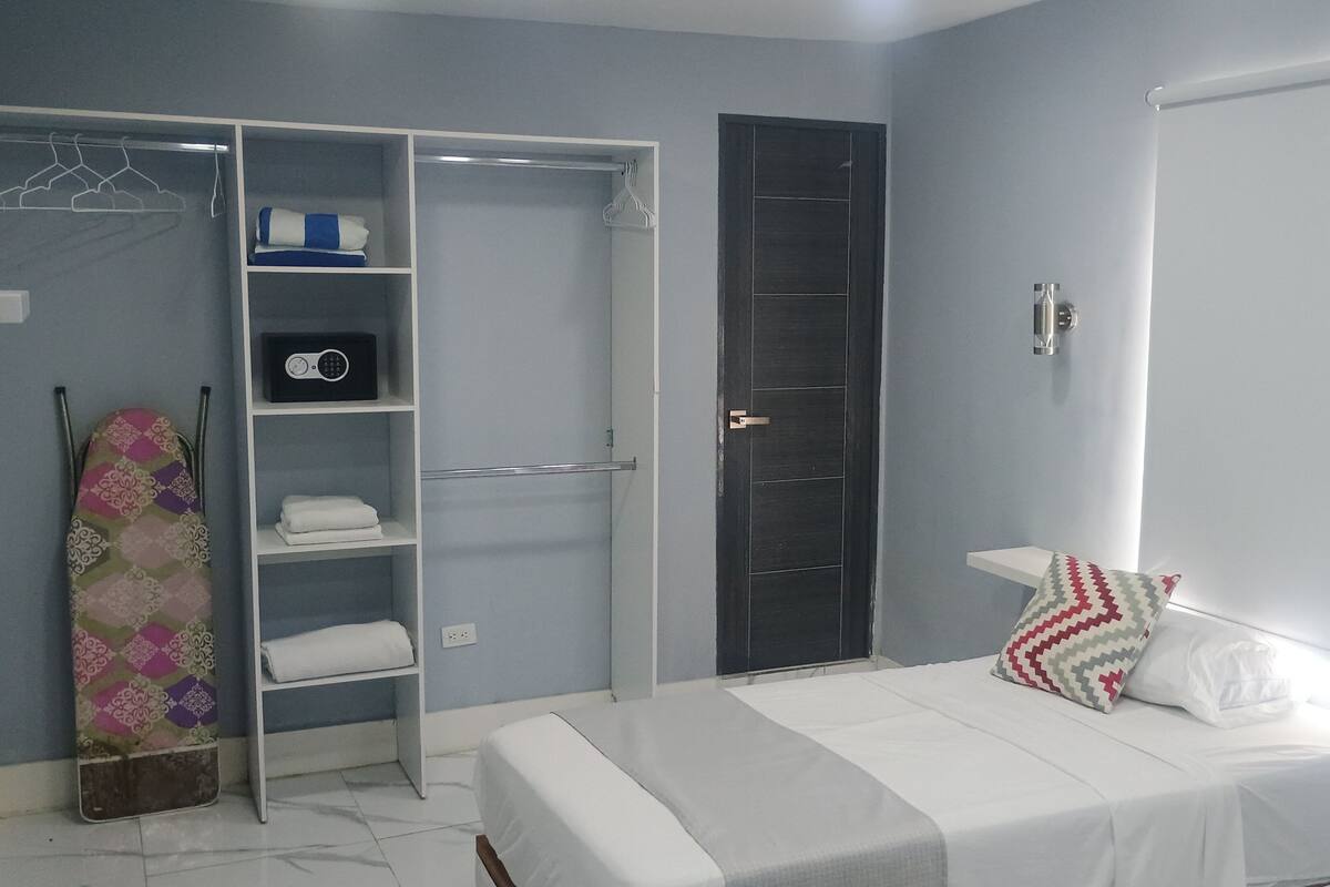 Economy Double Room | Minibar, in-room safe, blackout curtains