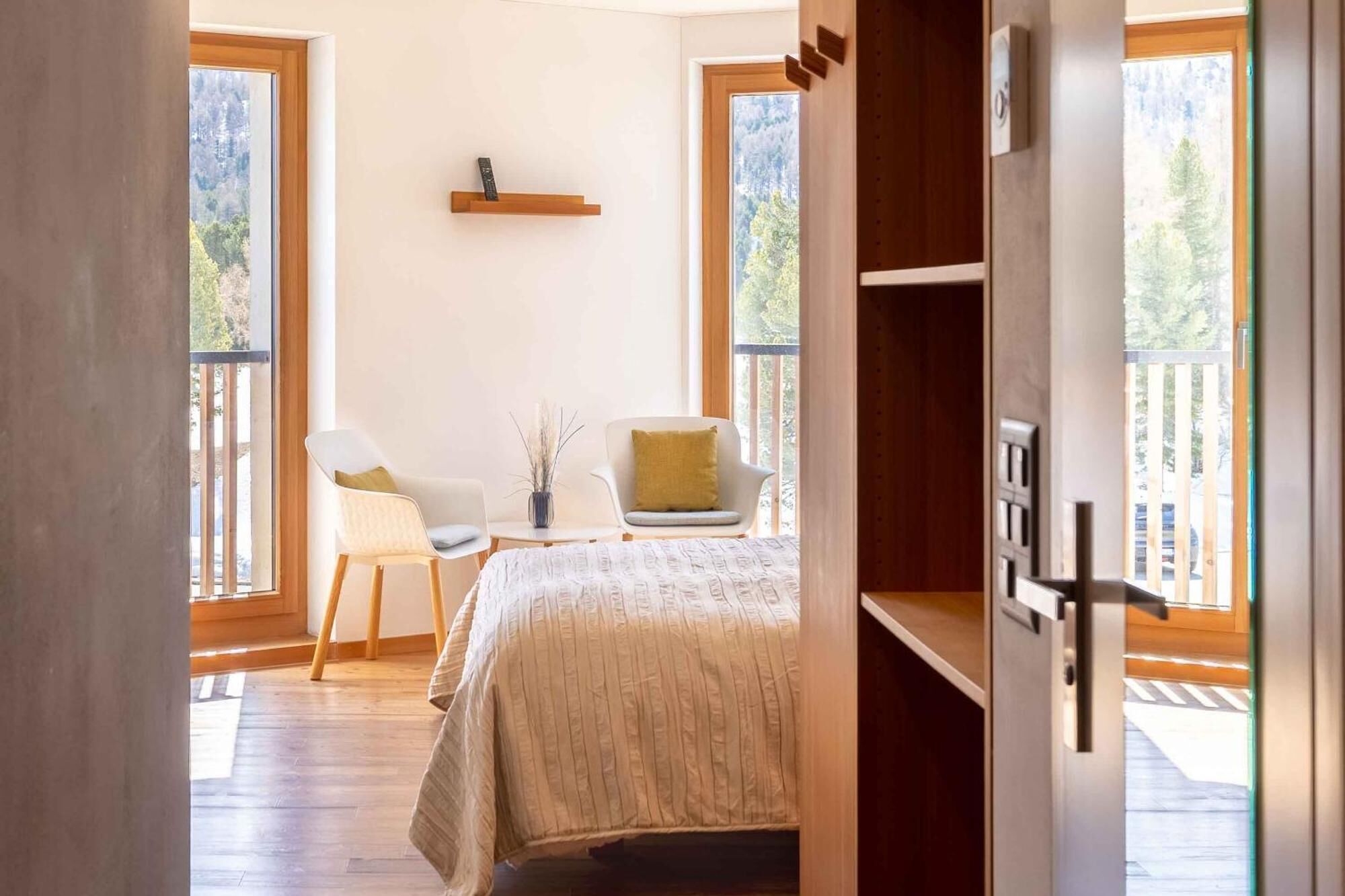 Basic Double Room, Mountain View | Minibar, in-room safe, blackout drapes, soundproofing
