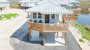 Terrace/patio - Cinema Shores – Ocean Views, Movie Magic & Golf Cart Included! (Port Aransas)