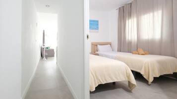 2 bedrooms, desk, iron/ironing board, travel crib