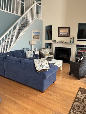 Smart TV, fireplace, DVD player, books