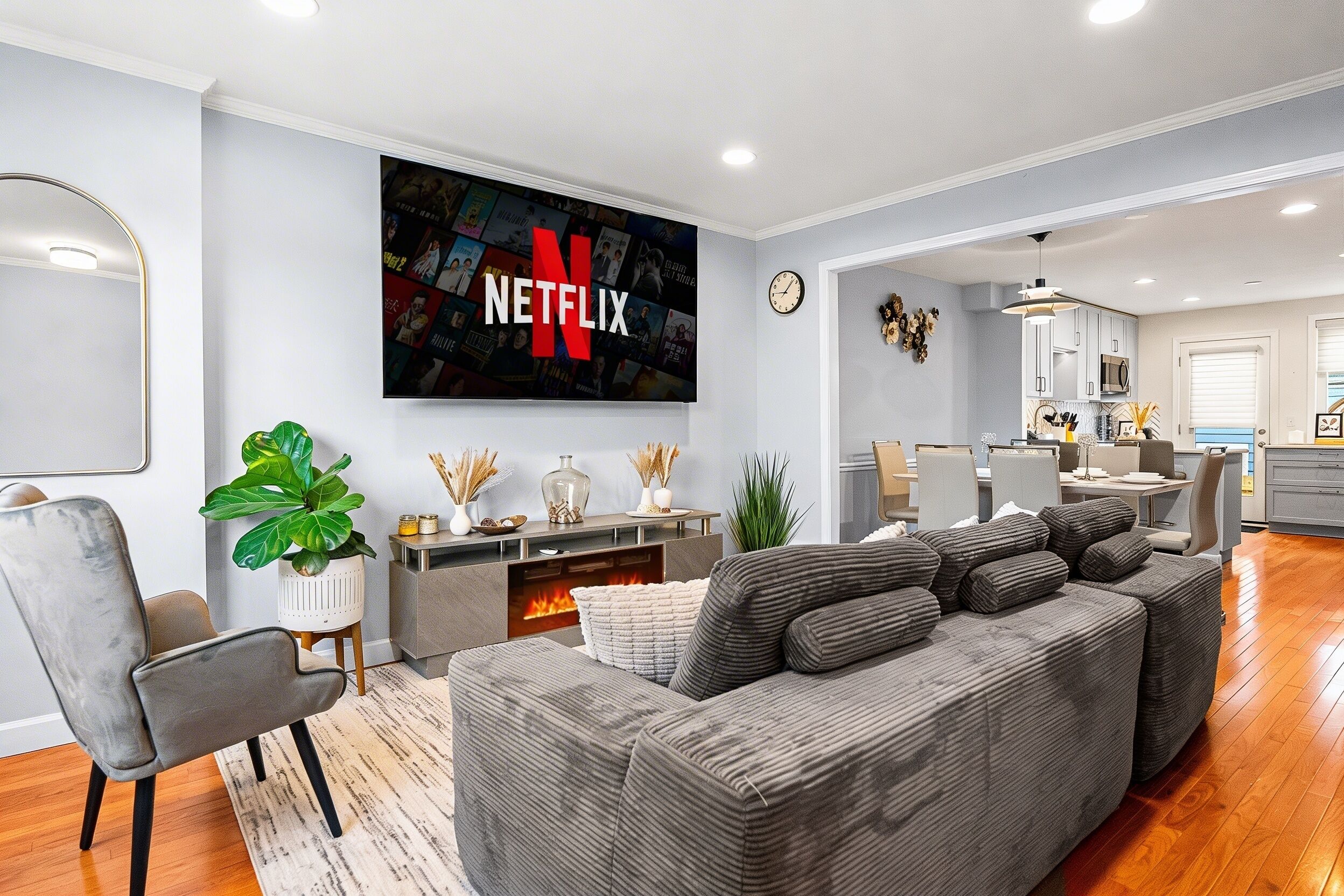 Spacious main living room with plush seating,  Samsung 8K 85” smart TV,